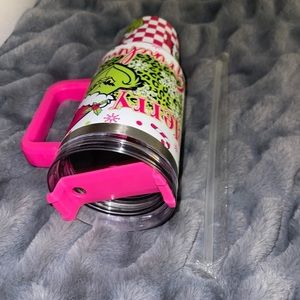 2 pink grinch tumblers